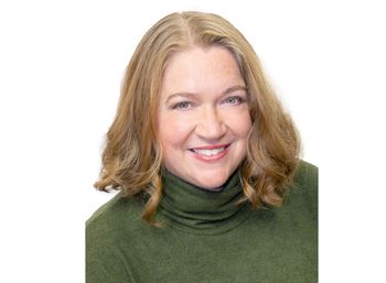 Portrait of Erin Novak, Herman and Davis Properties.